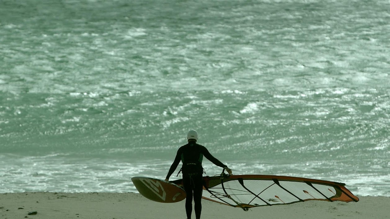 Windsurfista junto al mar · Luz de Bahía